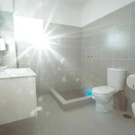 Апартаменты Modern In With Shared Pool.